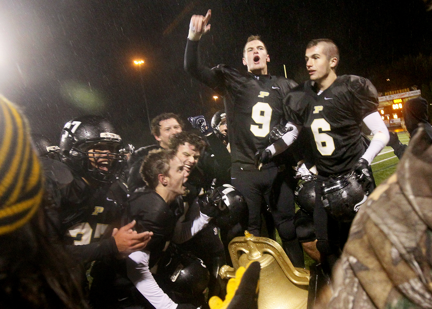 Perrysburg Excels On and Off Football Field Against Rival