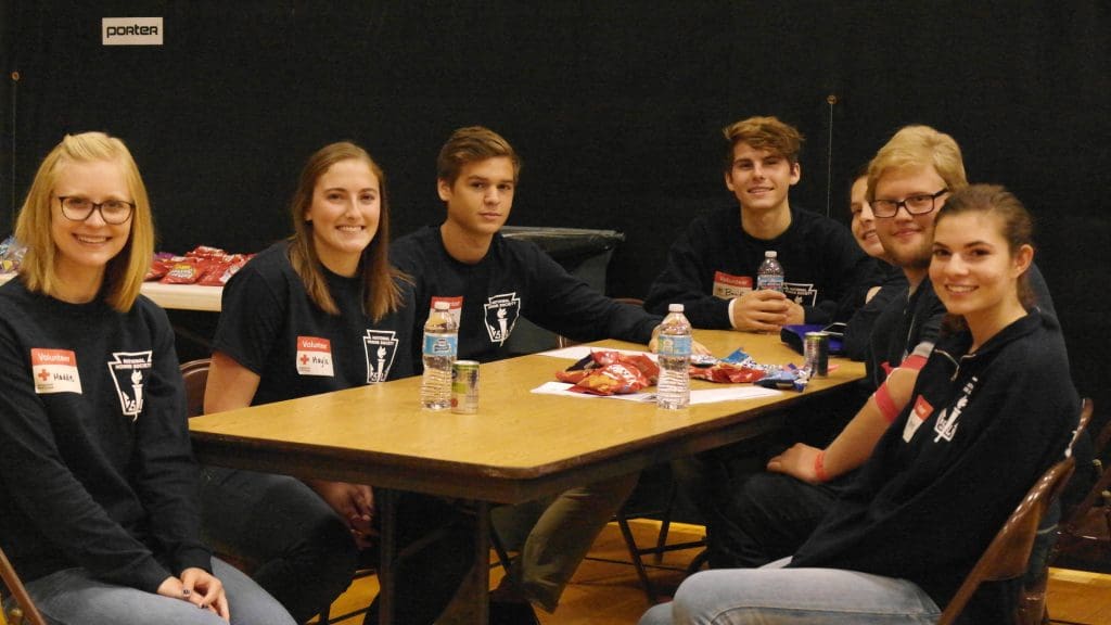 A group of NHS student volunteer at the blood drive (photo by Leah Cote)