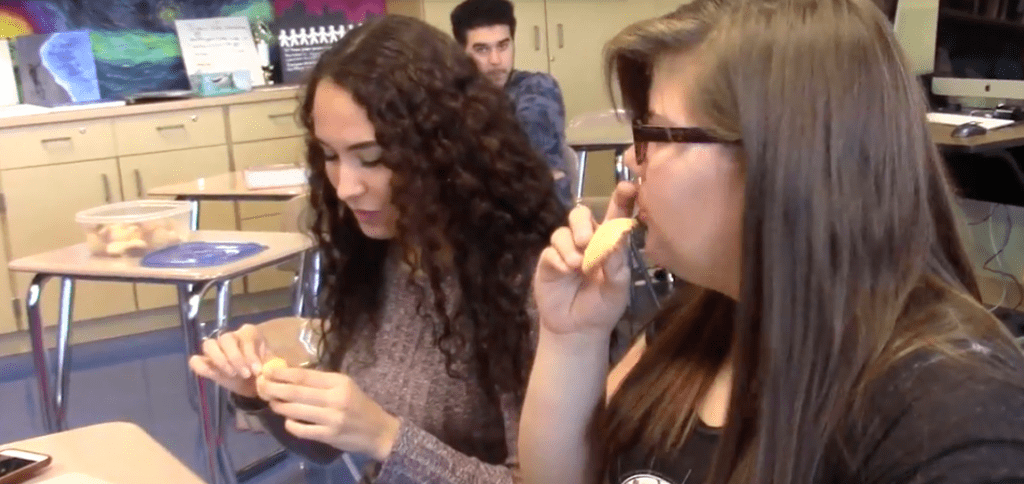 Students eating homemade cookies